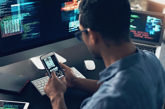 Programming smartphone or man typing cyber security or digital software with internet connection Male person programmer or coder with a cellphone technology or analytics with website information