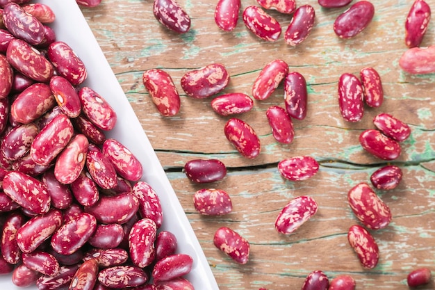 Red bean in bowl on the table Phaseolus vulgaris