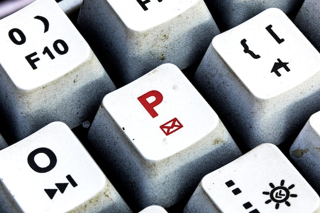 Retro Keyboard with P button in red color P button keyboard in close up macro