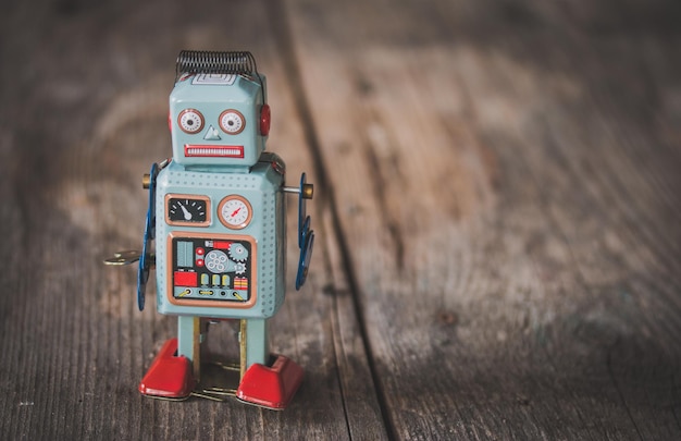 Robottilelusymboli chatbotille tai sosiaaliselle botille ja algoritmeille, puun pintakuvio