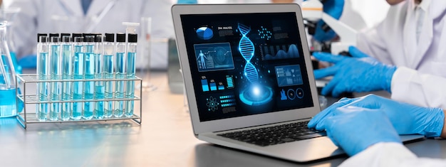 Scientist working on biotechnology computer software to study DNA Neoteric