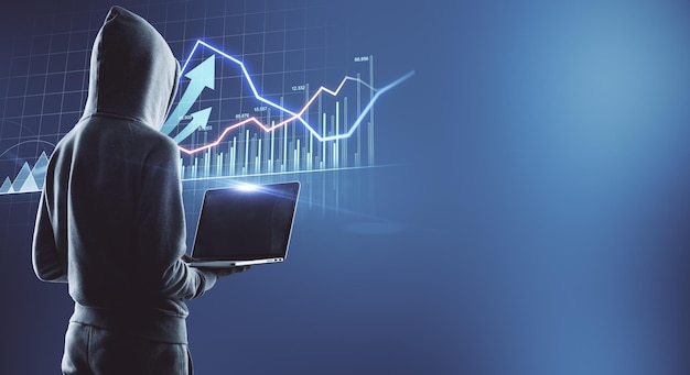 shadow stock market business concept with human back with laptop in front of virtual screen with financial chart quotes and graphs on abstract backdrop mockup