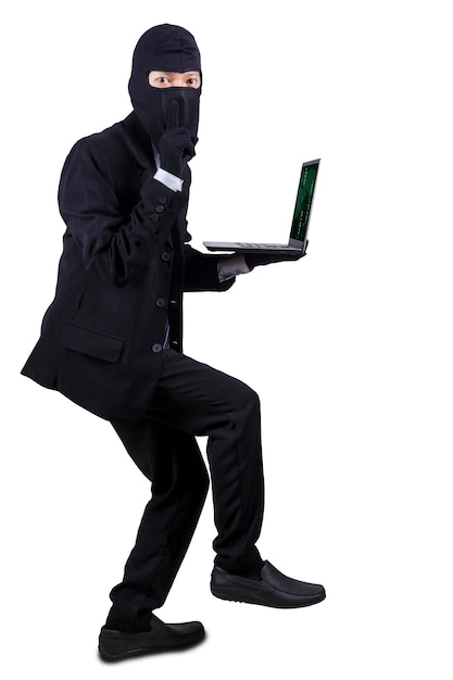 Side view of man with arms raised against white background