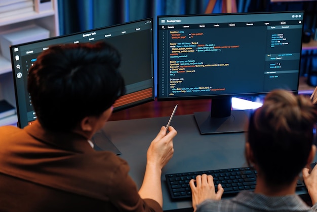 Smart IT developer looking at coding program application at back side Infobahn