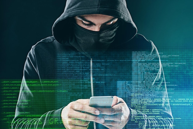 Smartphone cyber security and hacker internet web technology and man for online cybercrime Data protection secured website access person with hoodie coding and programming virus in system