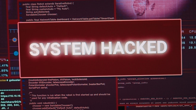 Software developer computer showing hacking attack alert with security breach, error message flashing on screen. Dealing with cyber crime attack and computer malfunction, system error. Close up.