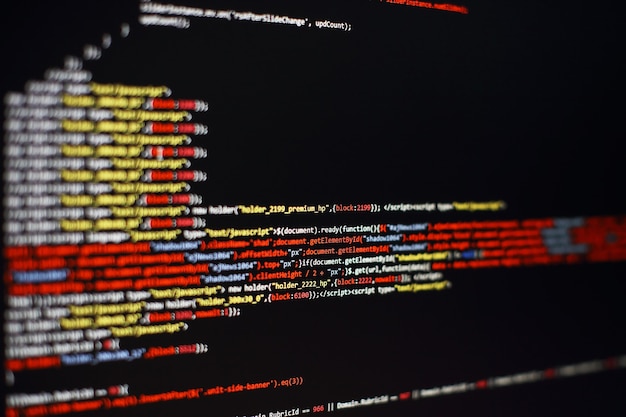 Software developer programming code. Abstract computer script code. Selective focus