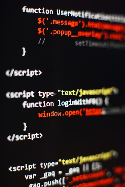 Software developer programming code. Abstract computer script code. Selective focus