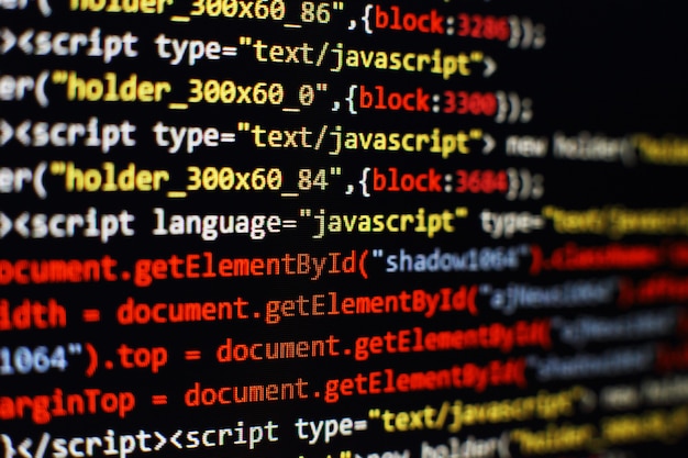 Software developer programming code. Abstract computer script code. Selective focus