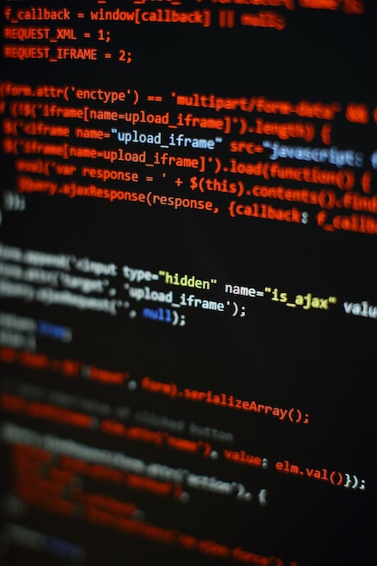 Software developer programming code. Abstract computer script code. Selective focus