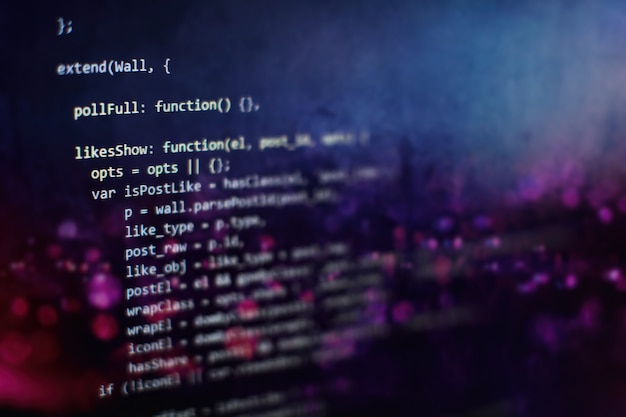 Software developer programming code. Abstract computer script code. Selective focus