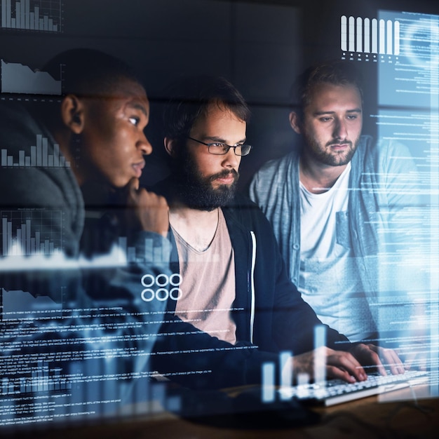 Software development hologram man and team with computer at night for typing source code and graph data Programming group and web developer with cybersecurity analytics website hacking and charts