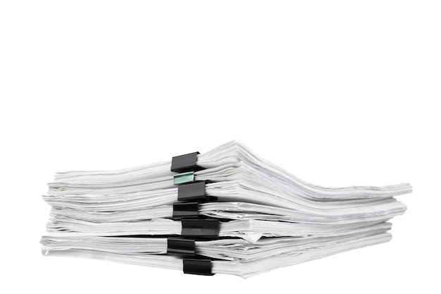 stack of papers with paper clips office folders white isolated background