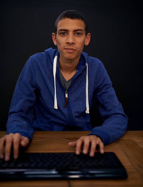 Student portrait and man working on keyboard typing on assignment for university Studying programming and educational development in home elearning on technology and pov for male person