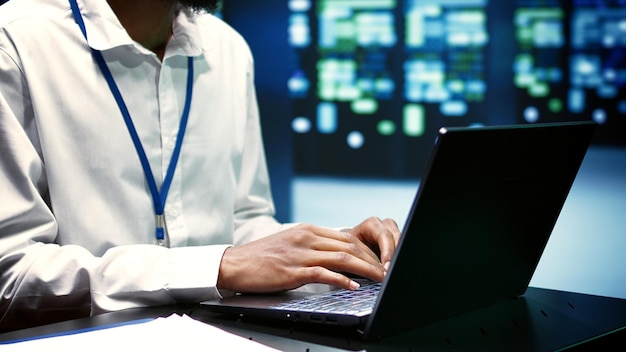 Supervisor mending data center operational issues arising due to high CPU usage insufficient memory and misconfigured applications Programmer overseeing server clusters performance trends