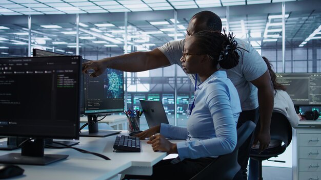 Supervisor overseeing worker using AI system software