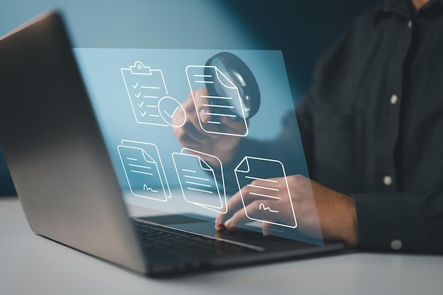 Symbolizes a digital audit process involving thorough inspection of electronic documents and records