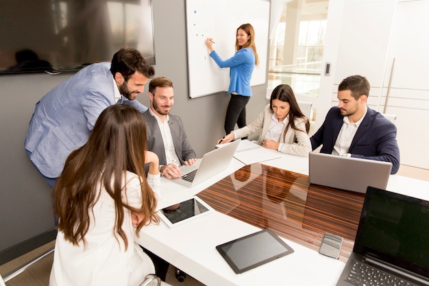 Team of young colleagues working together in an office