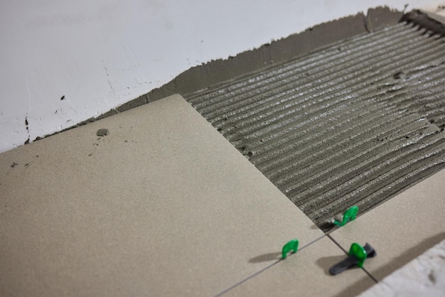 the comprehensive tile installation process using adhesive techniques and methods