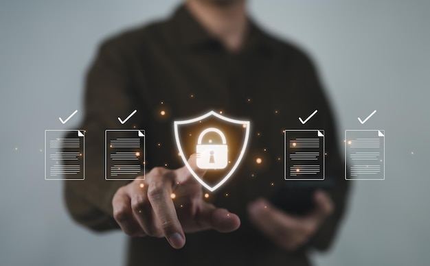 The concept of document safety and security protection system Businessman using online documentation database management software technology Manage files efficiently Edocument File access cyber