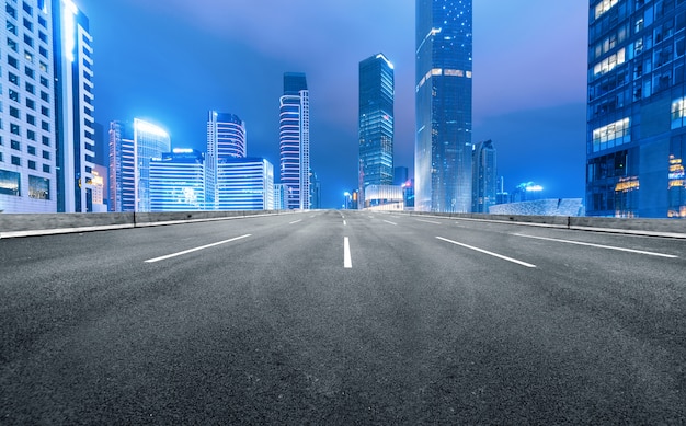 The expressway and the modern city skyline are in guangzhou, China.