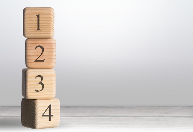 the order of priority in any activity is correct. a person sets wood blocks