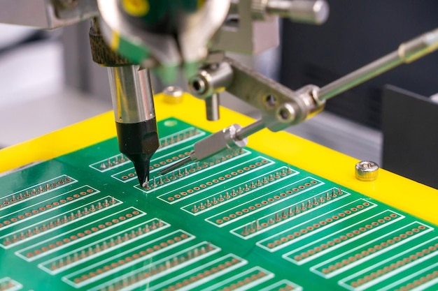 The soldering robot operation with PCB board The hitechnology electronics industry assembly process by robotic system