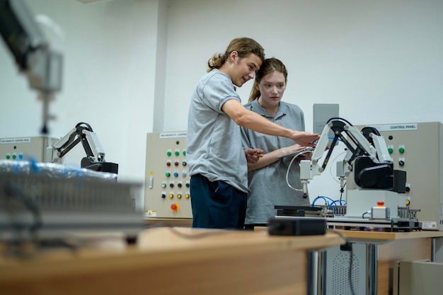 Trainee Robotics engineer learning with Programming and Manipulating Robot Hand