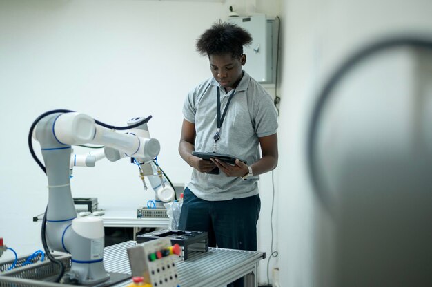 Trainee Robotics engineer learning with Programming and Manipulating Robot Hand