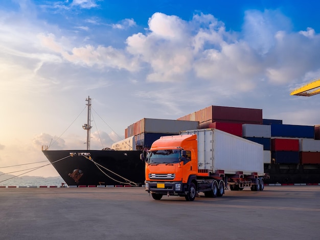 Truck on road against ship and cloudy sky