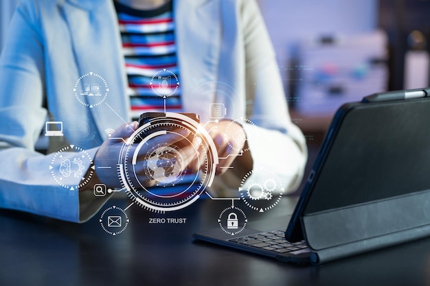 Two business people working on the project to protect cyber security of international company using laptop Padlock Hologram icons Teamwork concept