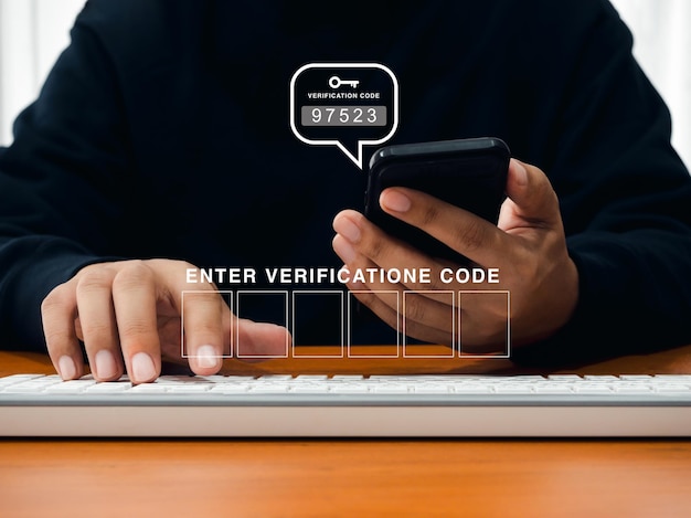 Two steps authentication or 2FA concept Empty verification code input box appear when man use mobile phone for checking password numbers with key icon in speech bubble cyber security technology