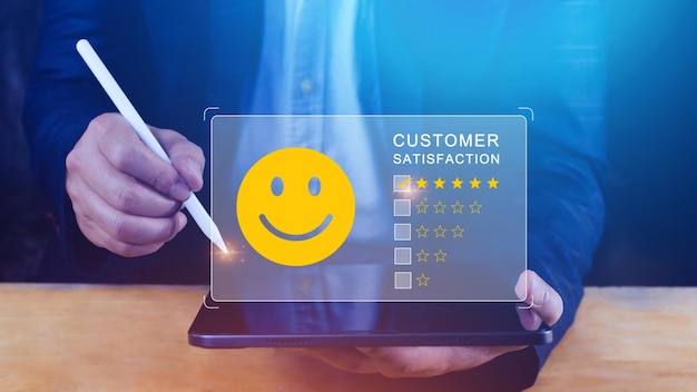 user gives rating to service experience on online application customer review satisfaction feedback survey concept customer can evaluate quality of service leading to reputation ranking of business