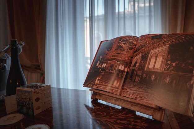 Venice luxury interior open book on table with natural and artificial lighting