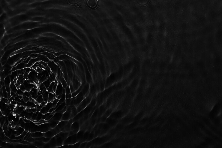 Kuva water black surface abstract background waves and ripples texture of cosmetic aqua moisturizer with bubbles