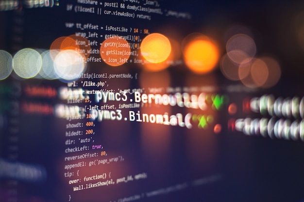 Website HTML Code on the Laptop Display Closeup Photo. Information technology website coding standards for web design Programmer developer screen.