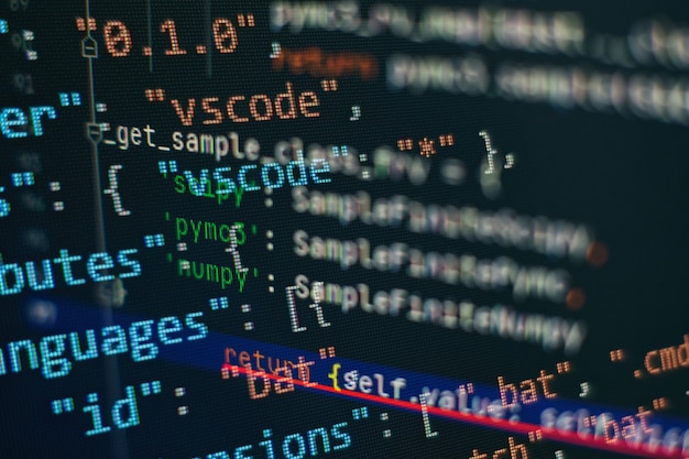 Website HTML Code on the Laptop Display Closeup Photo. Information technology website coding standards for web design Programmer developer screen.
