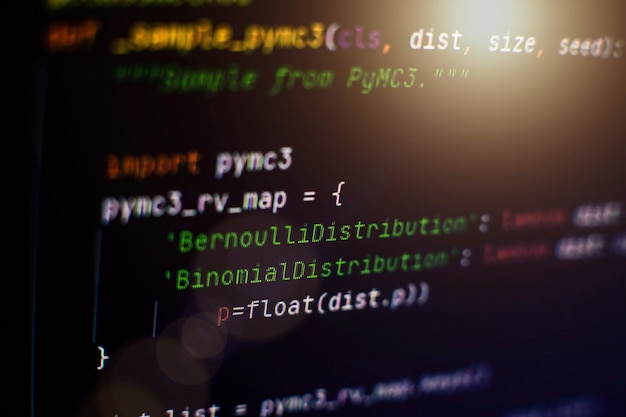 website html code on the laptop display closeup photo. information technology website coding standards for web design programmer developer screen.
