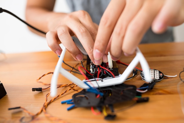Welding the wire on flying drone