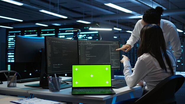 Woman updating server room supercomputers systems