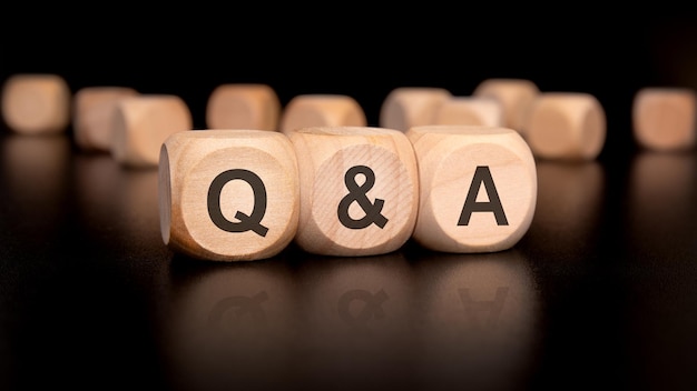 Wooden blocks featuring q and a letters cater to various information