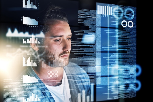 Young man data and analytics with hologram for future development statistics or dashboard Male person programmer or analyst with graph chart or digital information for technology with coding
