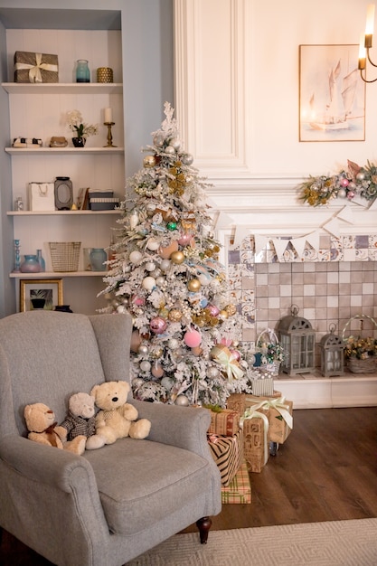 02.02.2019, Saint-Petersburg, Russia, beautiful modern design of the room in delicate light colors decorated with Christmas tree,decorative elements.interior design, magic atmosphere. pastel colors