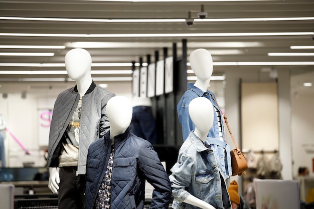 Photo 03.03.2021 group of mannequins in a clothing store. high quality photo