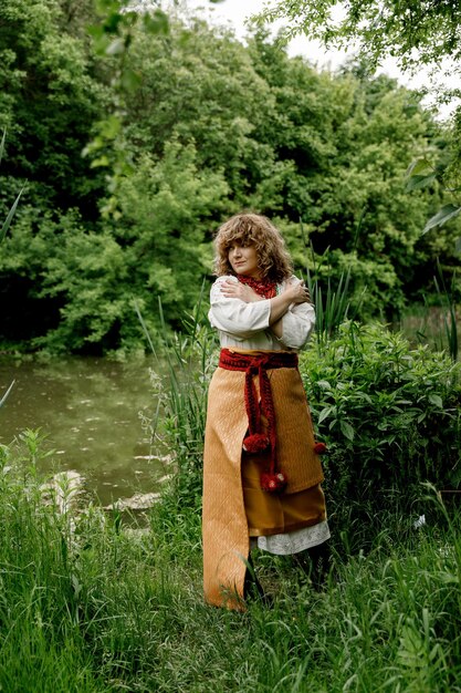 040622 Vinnitsa Ukraine two beautiful women mother and daughter wearing national embroidered Ukrainian linen shirts and colorful necklace