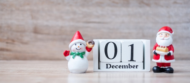 1 December calendar with Christmas decoration, snowman, Santa claus 