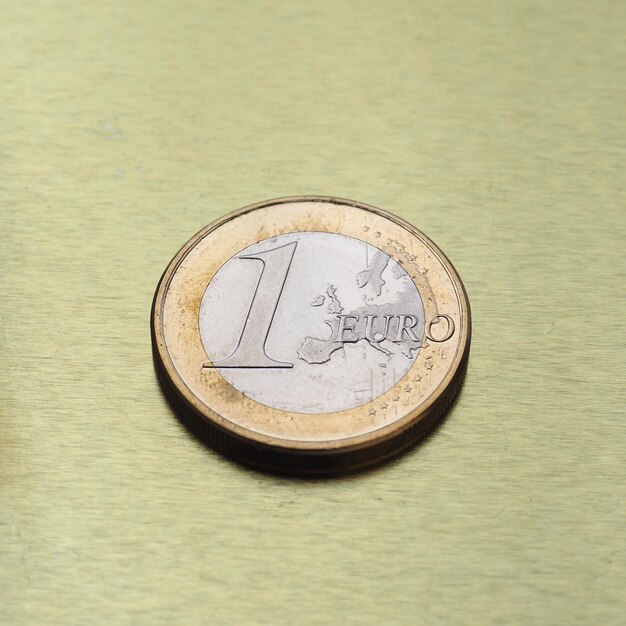 1 euro coin European Union over gold background