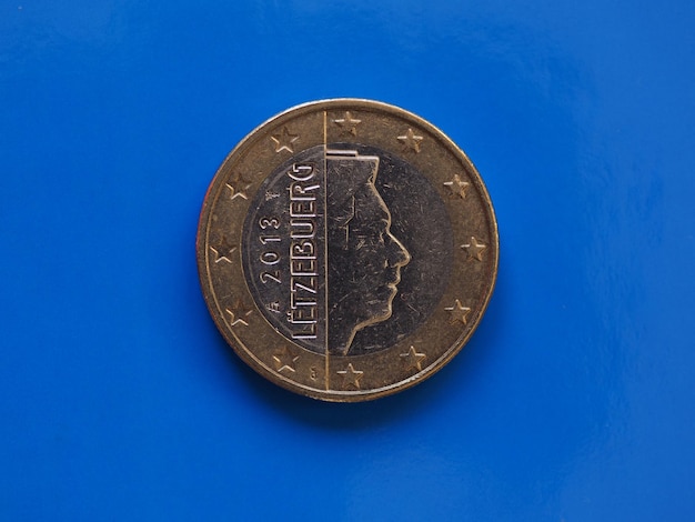 1 euro coin European Union Luxembourg over blue