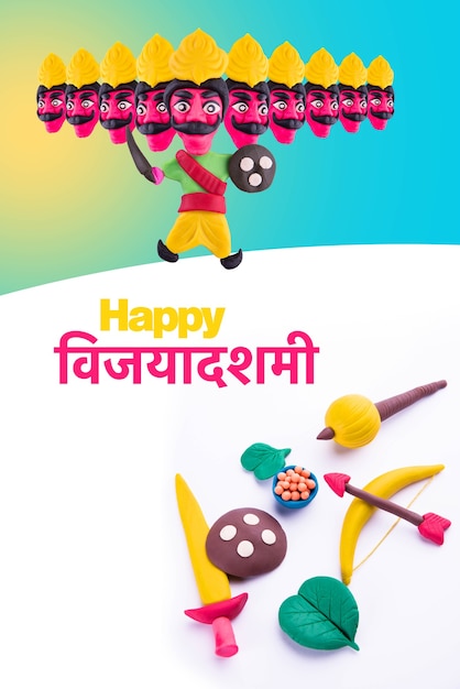 10 headed ravana or ravan made using colourful clay or dough - Happy Dussehra or Vijayadashami or Ayudh Puja greeting