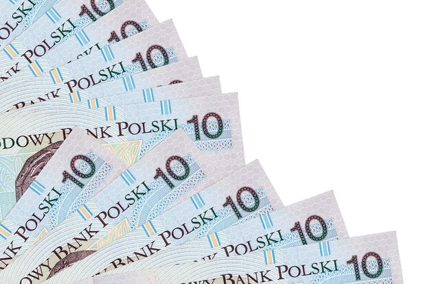 10 Polish zloty bills lies isolated on white wall with copy space stacked in fan close up. Payday time concept or financial operations